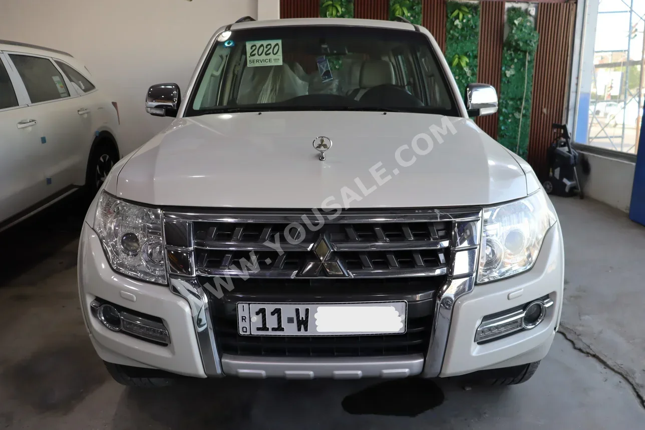 متسوبيشي باجيرو GLS 2020 اتوماتيك 96,000 كم 4 سلندر دفع رباعي اس يو في أبيض بنزين