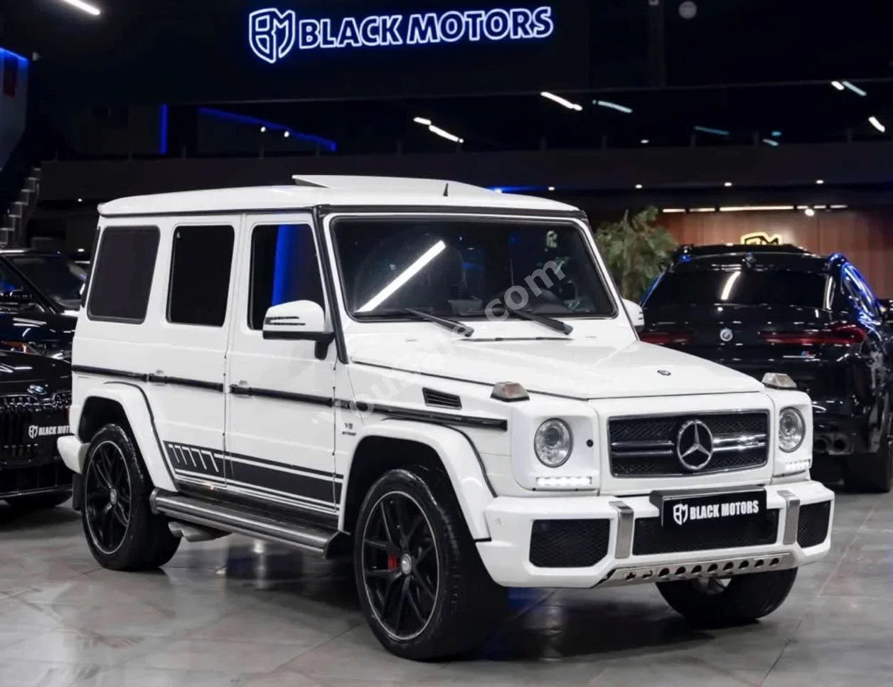 مرسيدس - بنز جي - كلاس 63 AMG 2017 اتوماتيك 80,000 كم 8 سلندر دفع رباعي اس يو في أبيض بنزين