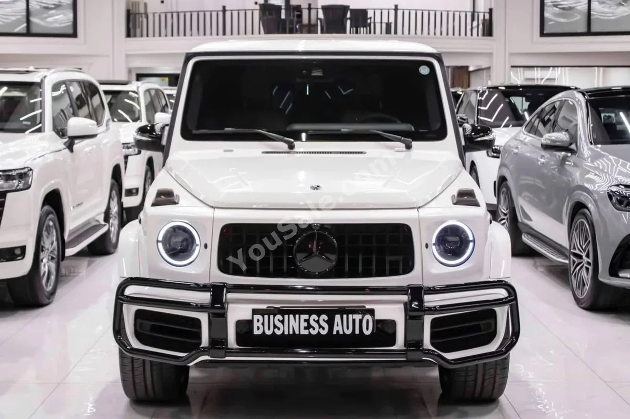 مرسيدس - بنز  جي - كلاس  500  2019  اتوماتيك  73,000 كم  8 سلندر  دفع رباعي  اس يو في  أبيض  بنزين