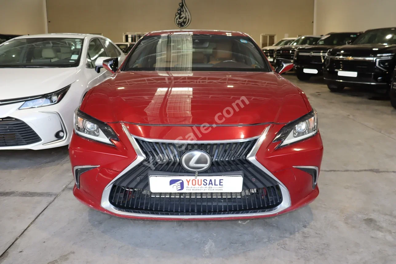 لكزس  اي اس  350  2019  اتوماتيك  70,000 كم  6 سلندر  دفع خلفي  سيدان  أحمر  بنزين