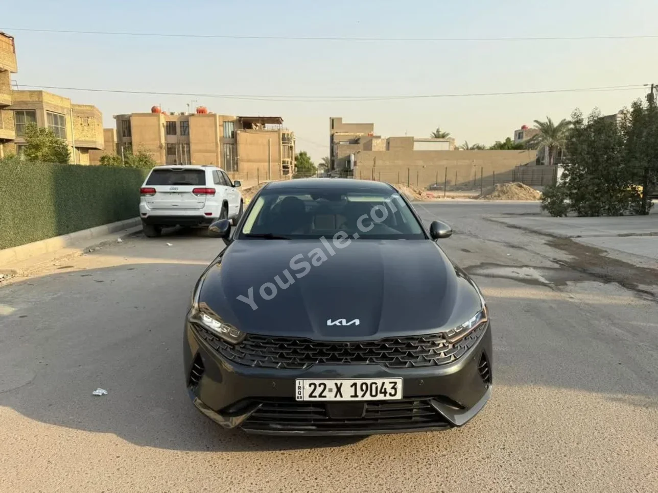 كيا  كيه 5  2023  اتوماتيك  70,000 كم  4 سلندر  دفع أمامي  سيدان  رمادي  بنزين
