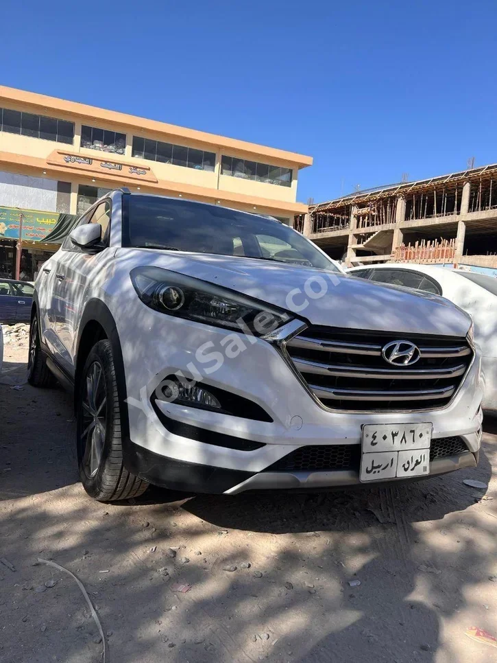 Hyundai  Tucson  2017  Automatic  143,000 km  4 Cylinder  4WD  SUV  White  Gasoline
