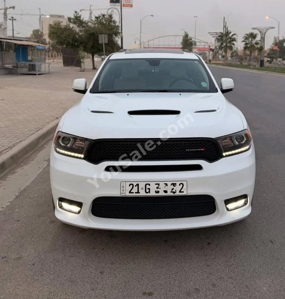 دودج دورانغو 2020 اتوماتيك 61,000 كم 6 سلندر دفع رباعي اس يو في أبيض بنزين