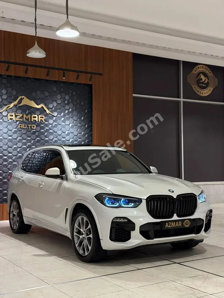 بي ام دبليو  الفئة - اكس  5  2021  اتوماتيك  60,000 كم  6 سلندر  دفع رباعي  اس يو في  أبيض  بنزين