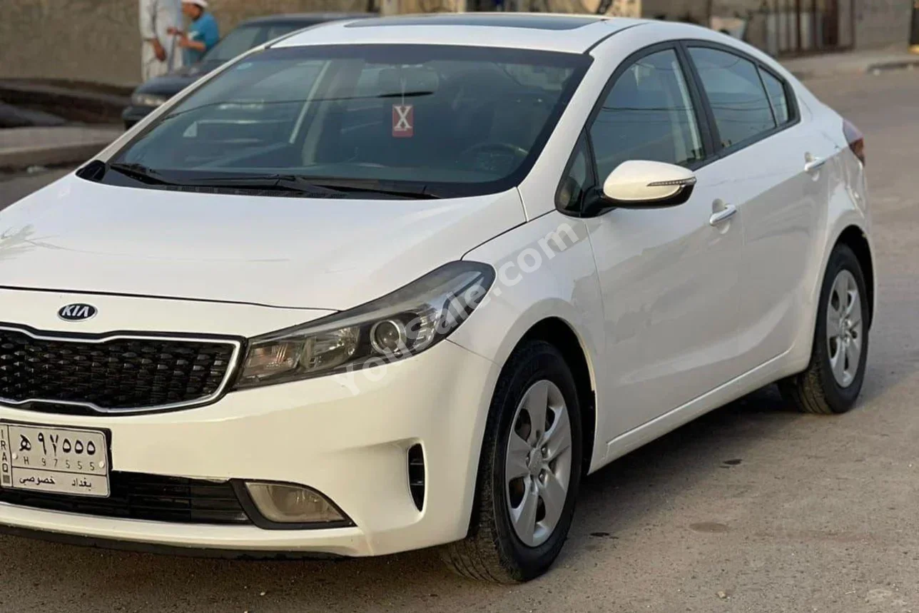 Kia  Cerato  2018  Automatic  120,000 km  4 Cylinder  FWD  Sedan  White  Gasoline