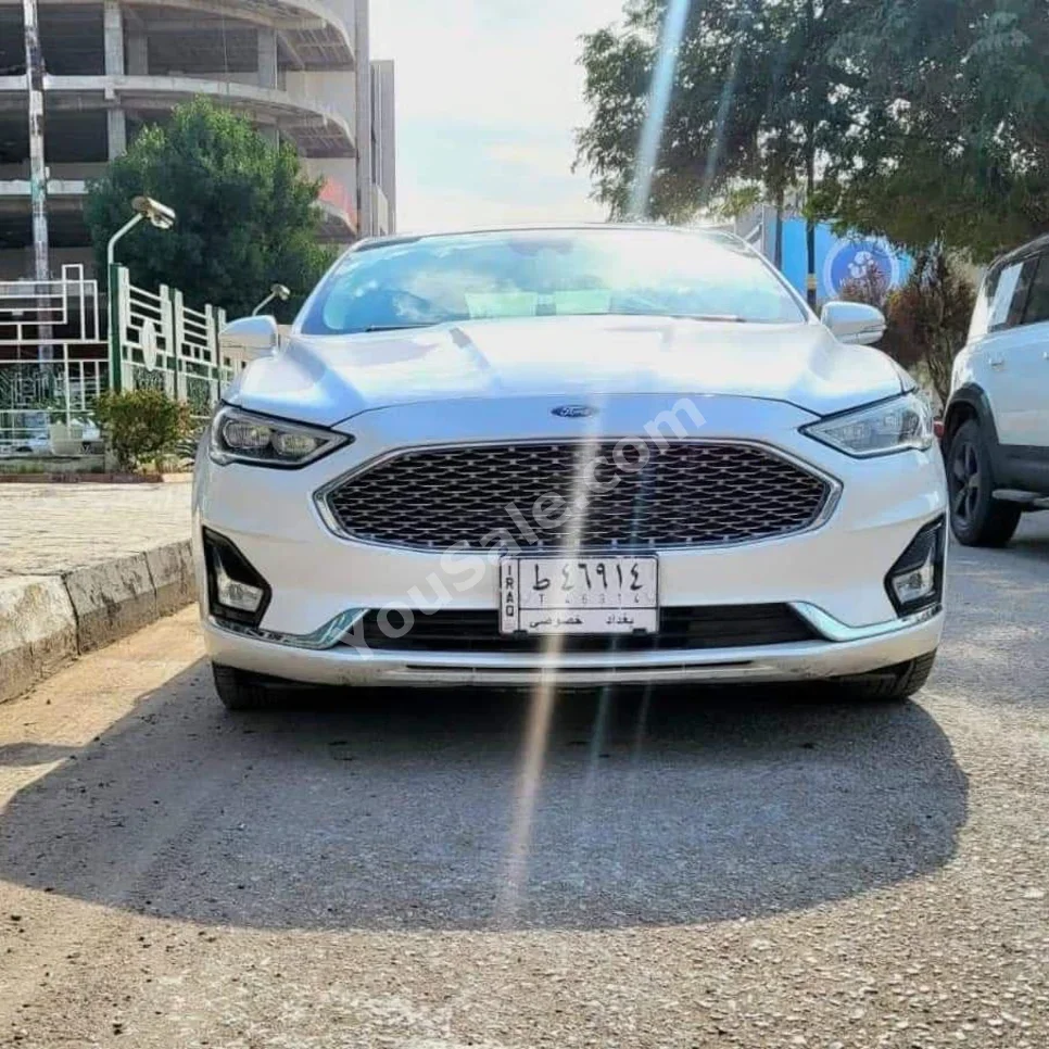 Ford  Fusion  2019  Automatic  47,000 km  4 Cylinder  FWD  Sedan  White  Gasoline