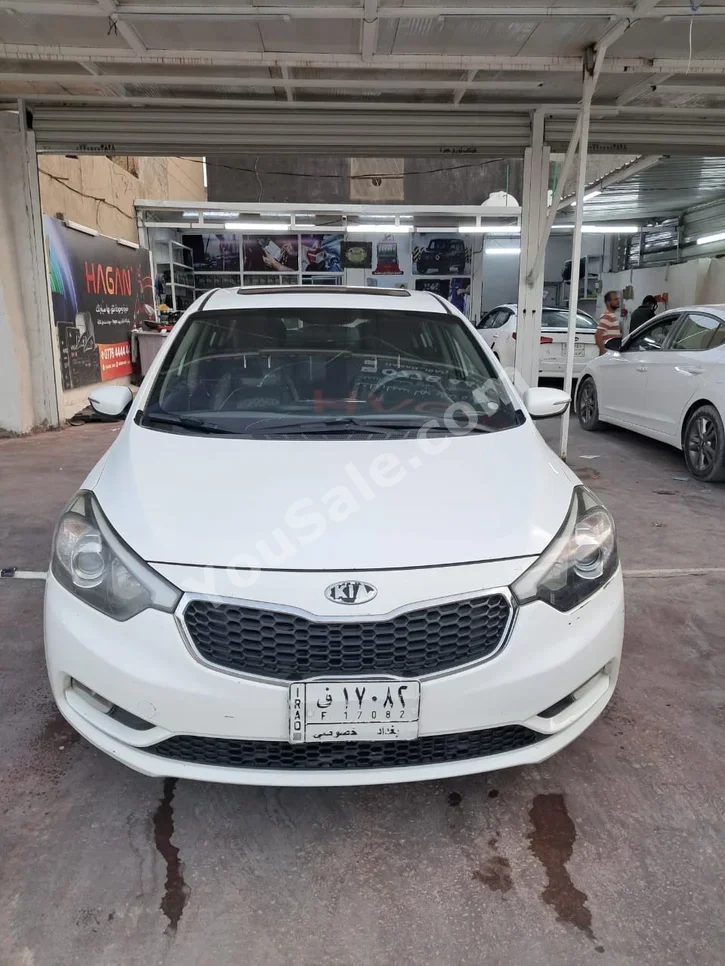 Kia  Cerato  2014  Automatic  145,000 km  4 Cylinder  FWD  Sedan  White  Gasoline