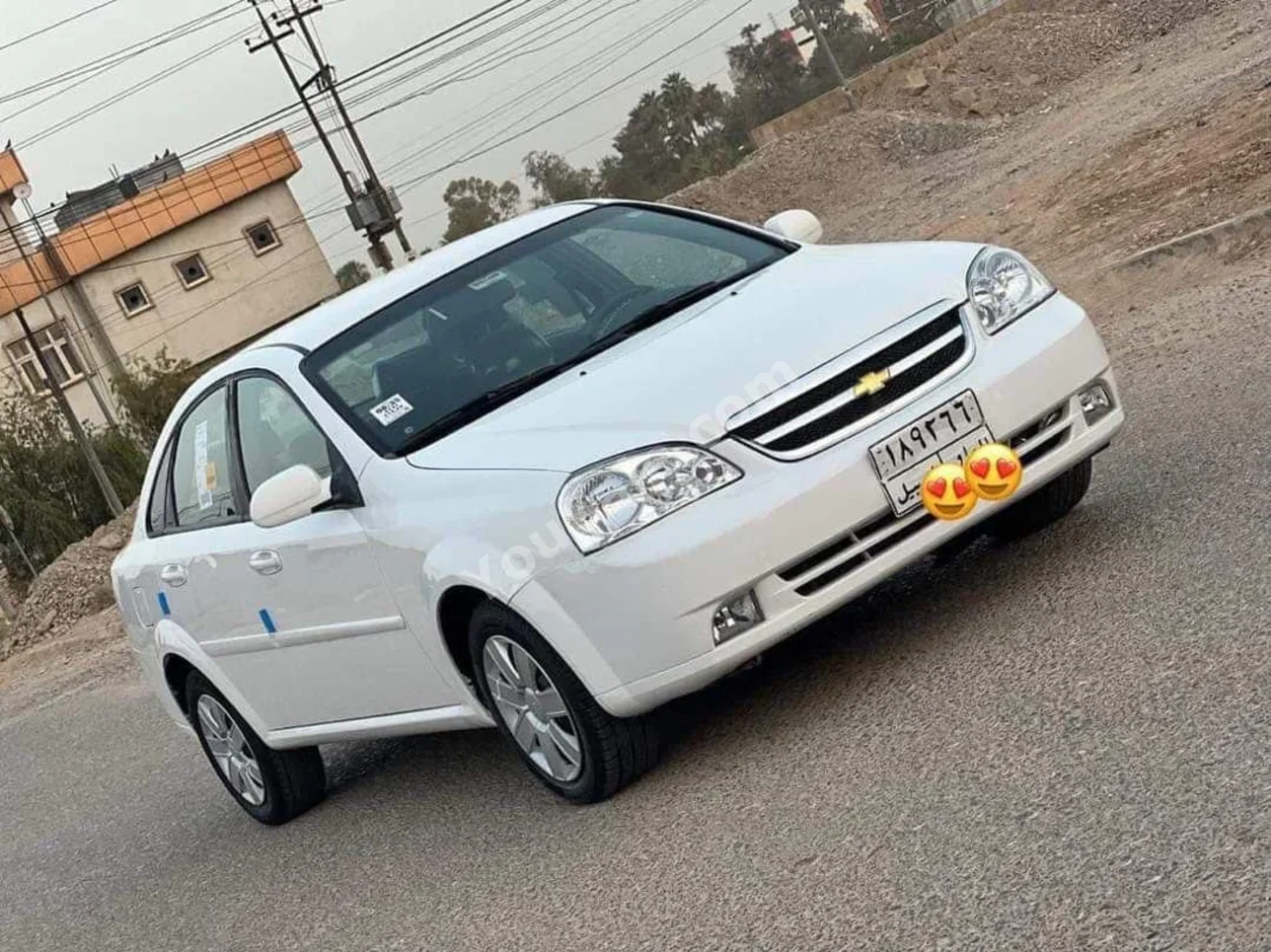 شفروليه اوبترا 2010 اتوماتيك 210,000 كم 4 سلندر دفع أمامي سيدان أبيض بنزين