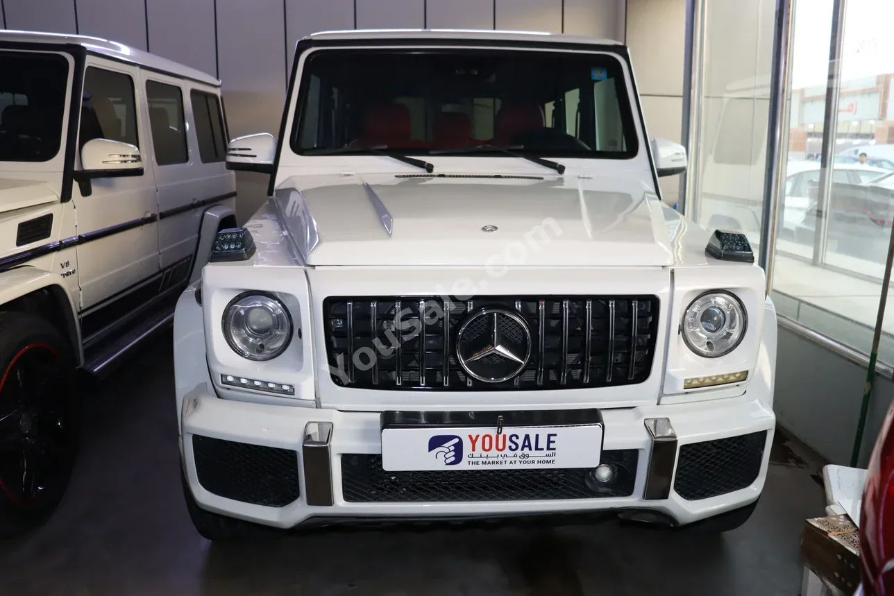 مرسيدس - بنز جي - كلاس 63 AMG 2001 اتوماتيك 185,000 كم 8 سلندر دفع رباعي اس يو في أبيض بنزين