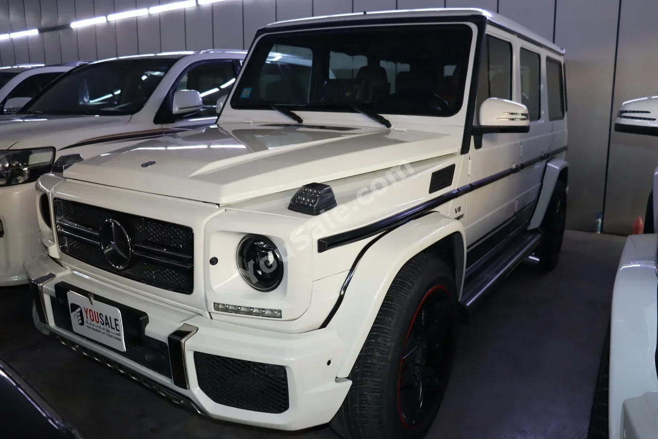 مرسيدس - بنز جي - كلاس 63 AMG 2011 اتوماتيك 95,000 كم 8 سلندر دفع رباعي اس يو في أبيض بنزين