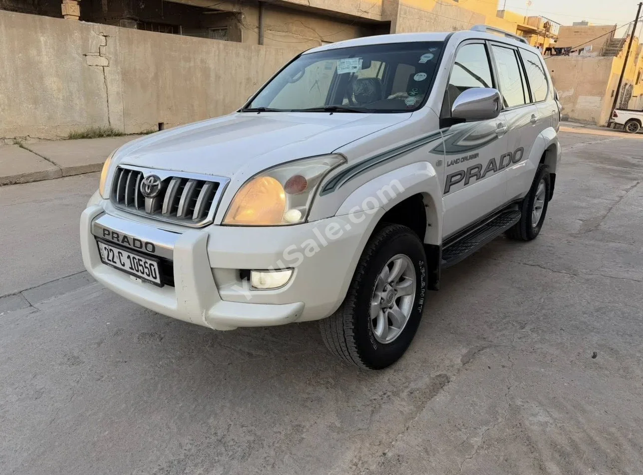 تويوتا برادو 2008 اتوماتيك 446,000 كم 4 سلندر دفع رباعي اس يو في أبيض بنزين