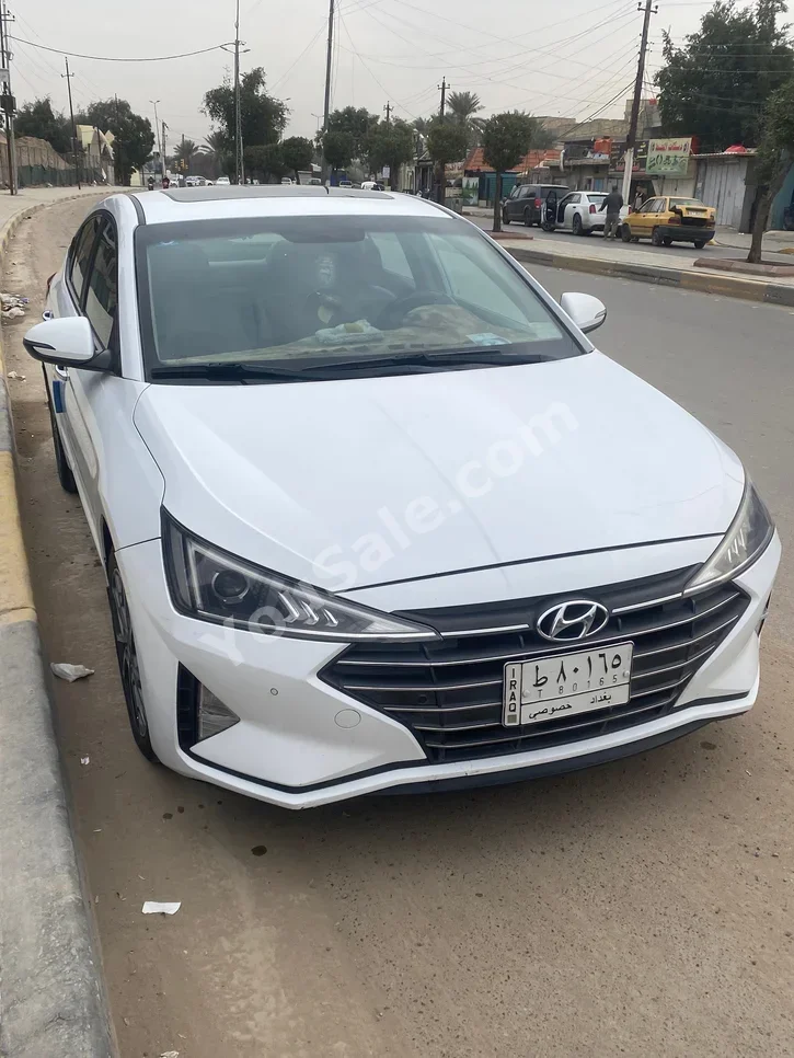 هيونداي النترا 2019 اتوماتيك 146,000 كم 4 سلندر دفع أمامي سيدان أبيض بنزين