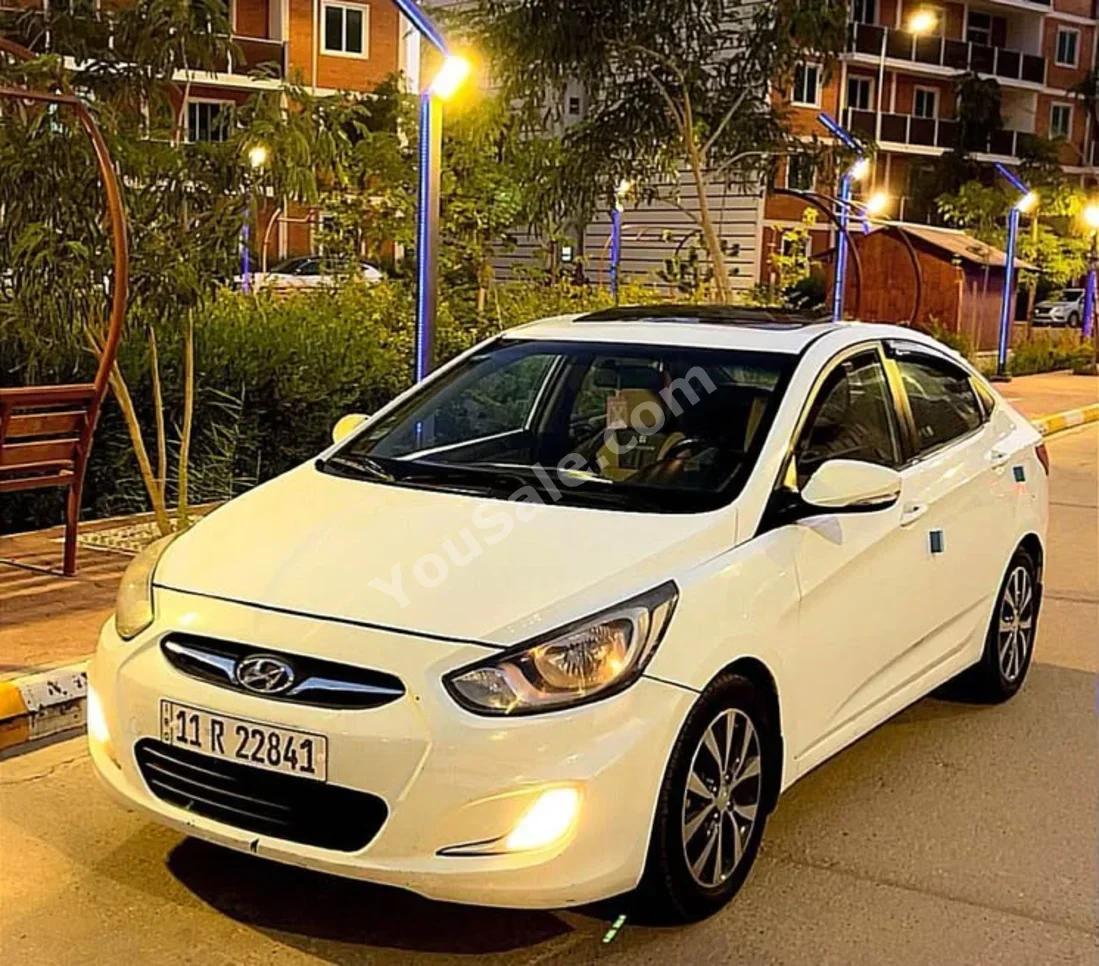 Hyundai  Accent  2014  Automatic  73,000 km  4 Cylinder  FWD  Sedan  White  Gasoline